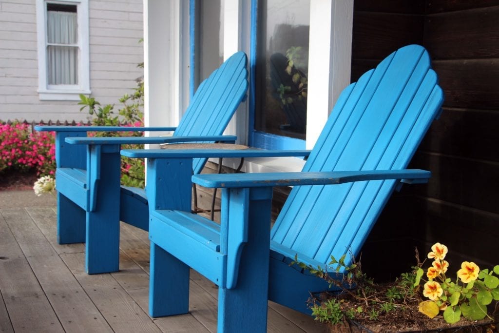 Adirondack chairs on the front porch of the inn